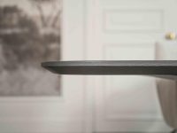 zwart eikenhouten tafelblad rond afgewerkt